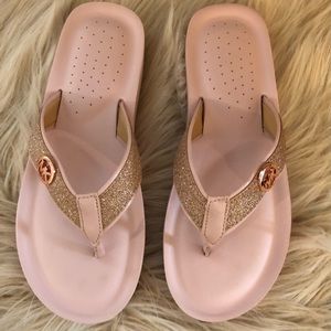 Pink and rose gold flip flops